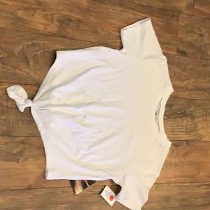 It’s a size large, the color is white and it’s from On Fire.